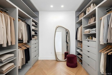 A fully renovated two-family townhouse spanning approximately 3 - photo 9