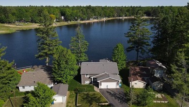 Welcome to this stunning custom-built lakefront home on Secord - photo 4