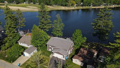 Welcome to this stunning custom-built lakefront home on Secord - photo 5