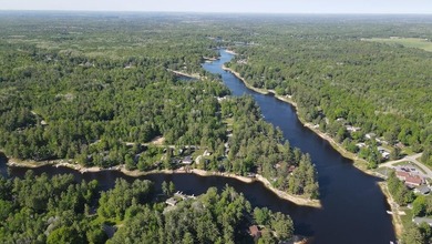 Welcome to this stunning custom-built lakefront home on Secord - photo 7