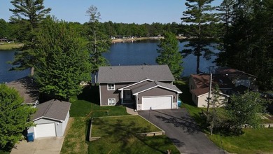Welcome to this stunning custom-built lakefront home on Secord - photo 9