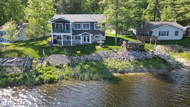 Welcome to this stunning custom-built lakefront home on Secord - photo 10