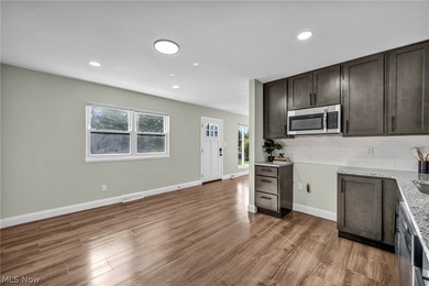 Welcome home to this beautifully updated ranch offering the - photo 10