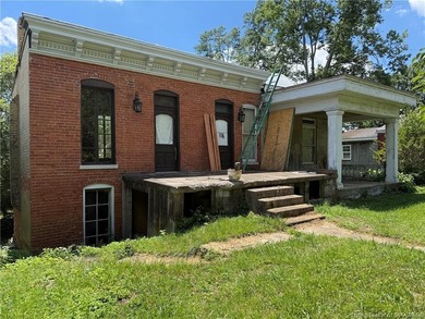 Wow! This home is so cool with river views and tons of exposed - photo 8