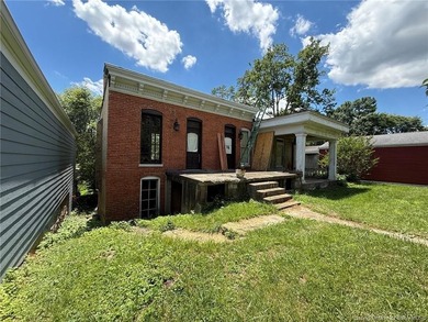 Wow! This home is so cool with river views and tons of exposed - photo 9