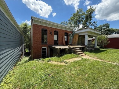 Wow! This home is so cool with river views and tons of exposed - photo 10