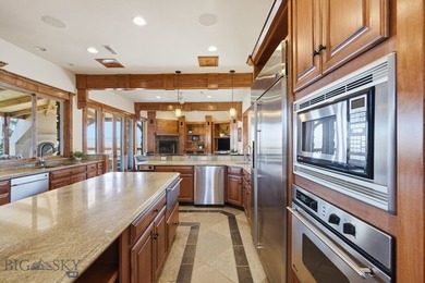 Perched above the Gallatin River with commanding, unobstructed - photo 9