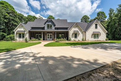 Nestled behind the secure gates of Tyler's premier acreage - photo 2