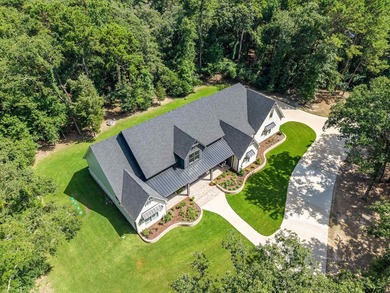 Nestled behind the secure gates of Tyler's premier acreage - photo 3
