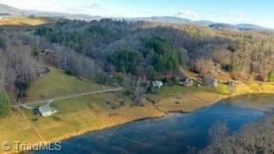 Lake Home For Sale in Grassy Creek, North Carolina