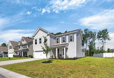Built in 2022, 107 Runner Stone Road is a desirable Belfort - photo 1