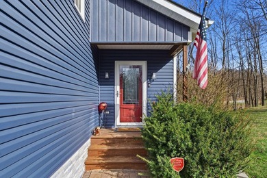 Escape to this impeccably maintained lakefront retreat in the - photo 5