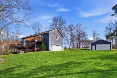 Escape to this impeccably maintained lakefront retreat in the - photo 9