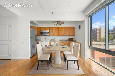 This stunning southern and Eastern Exposure corner two-bedroom - photo 1