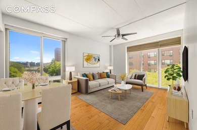 This stunning southern and Eastern Exposure corner two-bedroom - photo 2