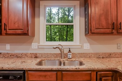 Nestled on a private 1/2 acre wooded lot in the desirable - photo 15
