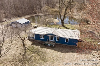 (private lake, pond, creek) Home For Sale in Hopkins Michigan