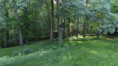 Nestled on a private 1/2 acre wooded lot in the desirable - photo 54