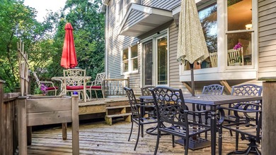 Nestled on a private 1/2 acre wooded lot in the desirable - photo 58