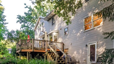 Nestled on a private 1/2 acre wooded lot in the desirable - photo 59
