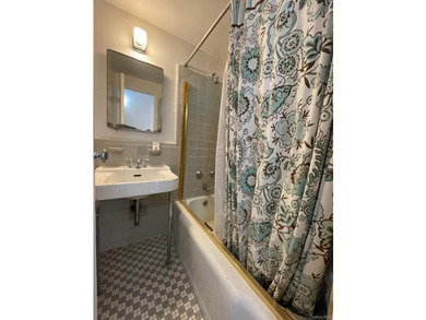 This cooperative unit apartment offers breathtaking views of the - photo 11