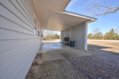 This quaint home sits in the perfect spot! Located just a short