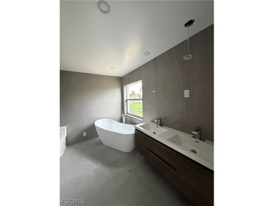 LOCATION, LOCATION!! Spacious 3 bedroom, 2 bath pool home - photo 5