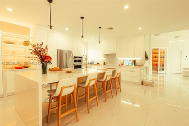 Welcome to this stunning fully renovated two-story residence in - photo 4