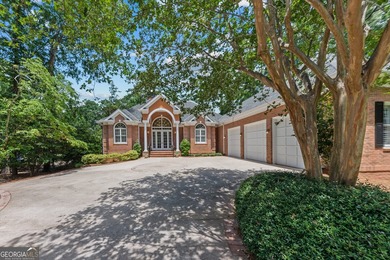 Nestled on 1.50 beautifully landscaped acres in the sought-after - photo 11