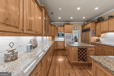 Nestled on 1.50 beautifully landscaped acres in the sought-after - photo 19