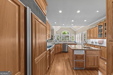 Nestled on 1.50 beautifully landscaped acres in the sought-after - photo 21