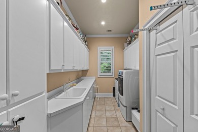 Nestled on 1.50 beautifully landscaped acres in the sought-after - photo 30