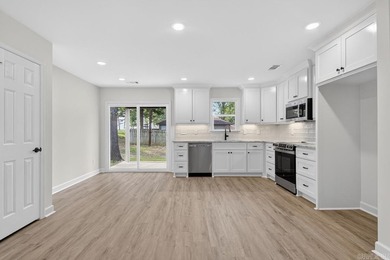 WOW! New Construction! Very pretty white siding w/white brick! - photo 6