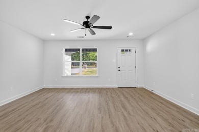 WOW! New Construction! Very pretty white siding w/white brick! - photo 9