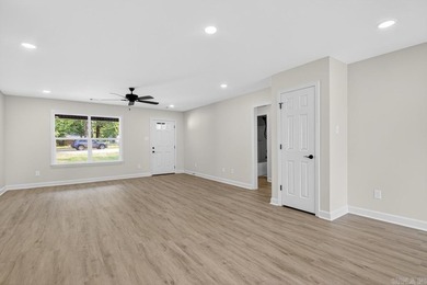 WOW! New Construction! Very pretty white siding w/white brick! - photo 10