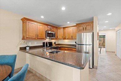 Beautifully renovated and ideally located, this ground-floor - photo 3