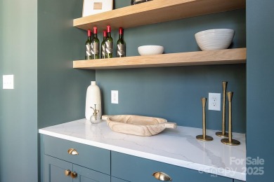 Nestled on nearly half an acre in the heart of prestigious Myers