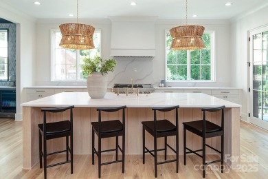 Nestled on nearly half an acre in the heart of prestigious Myers