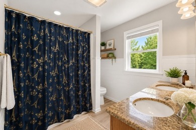 Welcome home to your own paradise! Enjoy a relaxed pond-front - photo 12