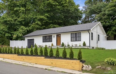 *No expense spared at this meticulously renovated two-level - photo 1