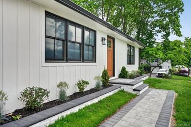 *No expense spared at this meticulously renovated two-level - photo 3