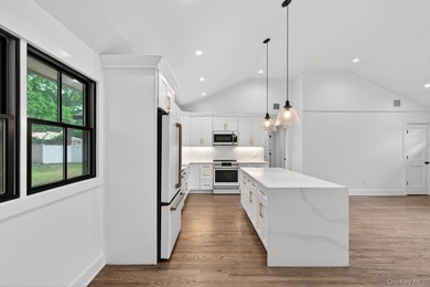 *No expense spared at this meticulously renovated two-level - photo 10