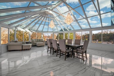 Set beyond a gated driveway and surrounded by mature landscaping - photo 14