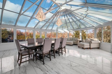 Set beyond a gated driveway and surrounded by mature landscaping - photo 15