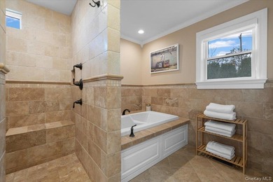 Set beyond a gated driveway and surrounded by mature landscaping - photo 19