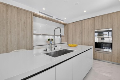 Discover Residence 601 - a rare corner residence in Royal Palm's - photo 19