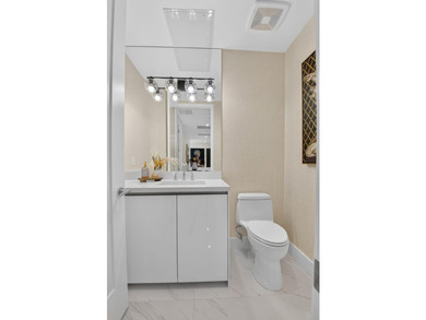 Discover Residence 601 - a rare corner residence in Royal Palm's - photo 32