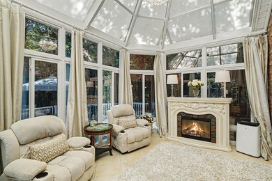 This exceptional 3-bedroom, 3.5-bath all-brick custom home is - photo 2