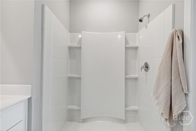 This single-story Harrisburg home design features three bedrooms - photo 13