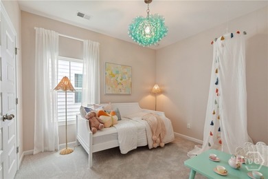 This single-story Harrisburg home design features three bedrooms - photo 18